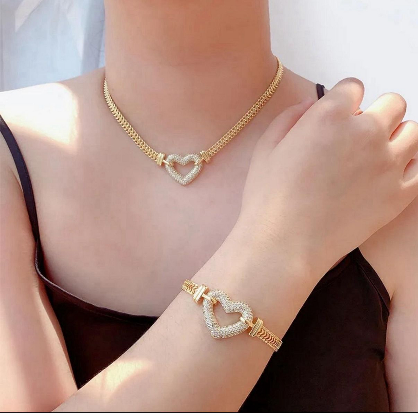 Set of necklace and bracelet hearts shaped 20 inches long.